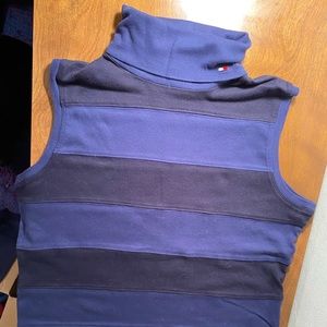 Tommy Hilfiger sleeveless turtleneck sweater.